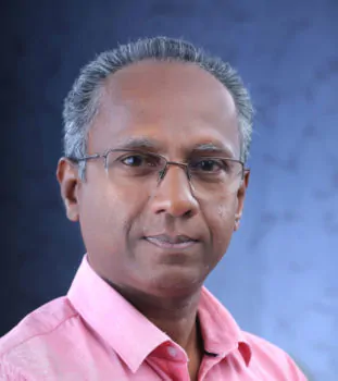 Dr. Sudarshan